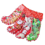 Load image into Gallery viewer, Four Christmas stocking-shaped gift bags filled with assorted colorful cat toys for winter holiday gifts