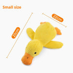 Load image into Gallery viewer, Small yellow squeaky duck plush toy measuring 25cm by 22cm, ideal calming chew pillow for dogs and puppies.