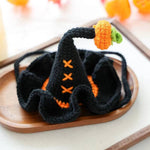 Load image into Gallery viewer, Black crocheted pet wizard hat with orange pumpkin decoration and ruffled brim for cats or small dogs Halloween costume