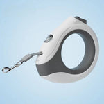 Load image into Gallery viewer, White and gray ring-shaped retractable pet leash with LED light for safe night walks and comfortable grip