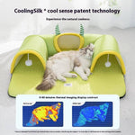 Load image into Gallery viewer, Cat resting comfortably on a breathable green cat tunnel bed with CoolingSilk cool sense technology for natural coolness.
