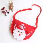 Load image into Gallery viewer, Red Christmas-themed pet bib with Santa face and adjustable straps for dogs and cats holiday outfit
