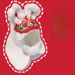 Load image into Gallery viewer, White fluffy pet costume hood with colorful embroidered face and curled ears on red background
