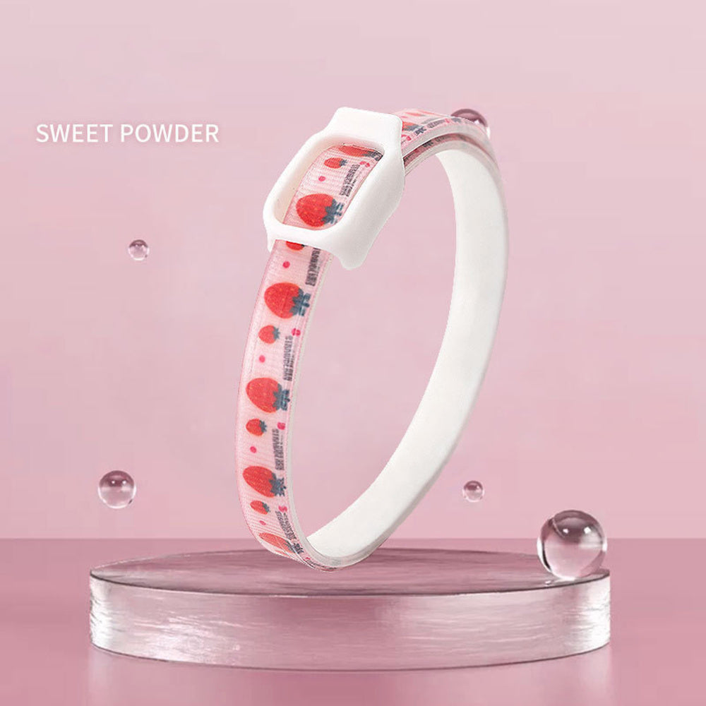 Pink flea and tick repellent collar for dogs and cats with strawberry pattern on a pink background
