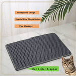 Load image into Gallery viewer, Gray cat litter box mat with honeycomb design, rice-shaped holes for paw massage and litter trapping on marble floor
