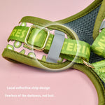 Load image into Gallery viewer, Close-up of green adjustable dog harness strap with reflective design for safety and durability on pink background
