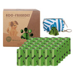 Load image into Gallery viewer, Eco-friendly green poop bags with bone prints, includes 36 rolls and a blue portable dispenser for easy cleanup.
