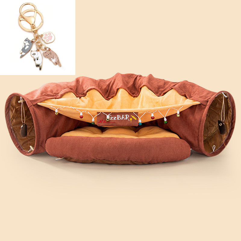 Durable collapsible cat tunnel with cushioned interior and hanging toys for interactive and washable pet playtime.