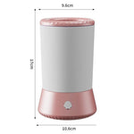 Load image into Gallery viewer, Compact electric pet paw cleaner with automatic washing function, designed for dogs and cats, portable grooming cup in pink and white.
