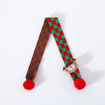 Load image into Gallery viewer, Knitted wool Christmas scarf for pets with red and green plaid pattern and pom-poms, featuring a snowman decoration
