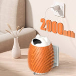 Load image into Gallery viewer, Automatic cat massager and pet hair brush with 2000mAh battery charging on wall outlet near sofa and vase
