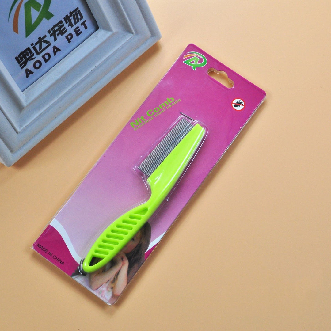Green anti-flea pet grooming comb in retail packaging, stainless steel fine teeth for effective flea removal in dogs and cats.