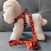 Christmas dog leash and adjustable chest harness set with festive red snowman pattern for small to large dogs