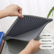 Hands showing the double-layer waterproof EVA cat litter box mat with textured non-slip surface and durable quality features