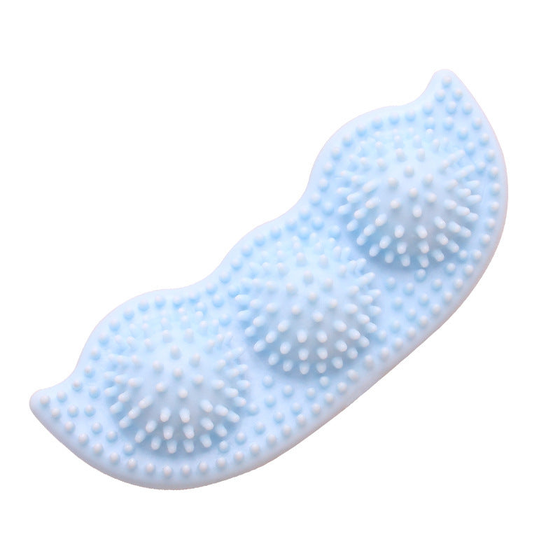 Blue textured chew toy with three rounded spikes designed for teeth cleaning in puppies and small dogs.