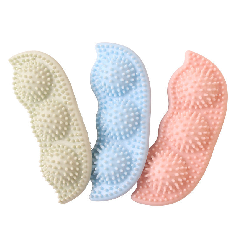 Three colorful textured chew stick balls in cream, blue, and pink for puppy teeth cleaning and chewing play.