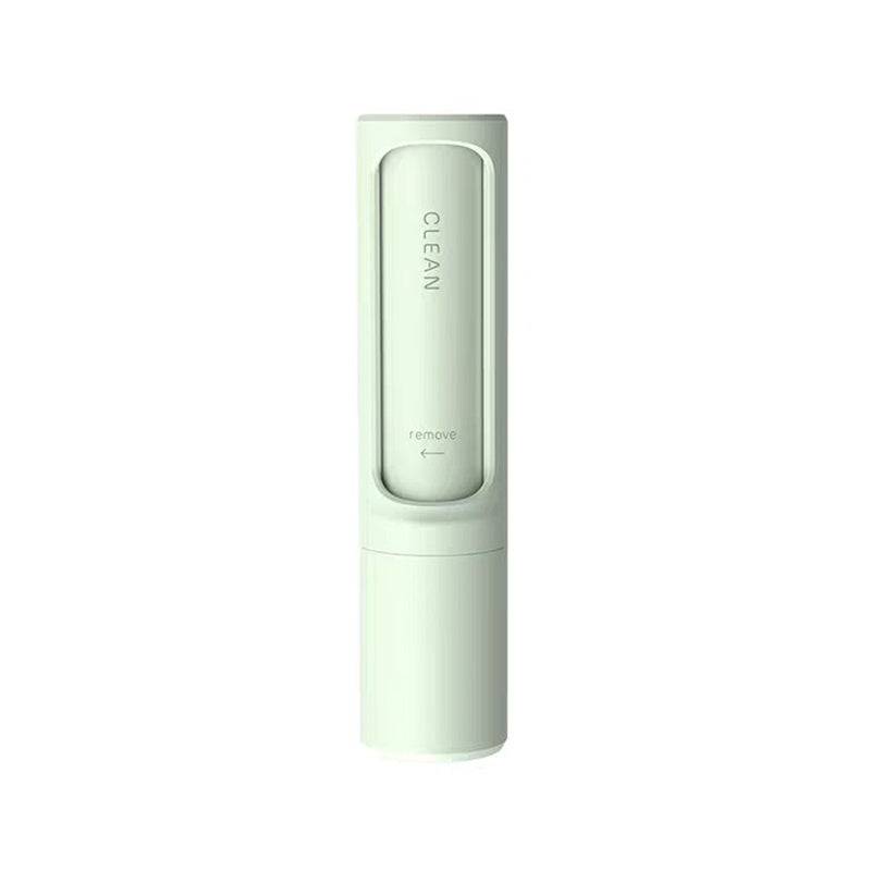 Green 2-in-1 Pet Hair Remover Brush designed for eco-friendly fur removal. Self-cleaning and reusable lint roller for pet owners.