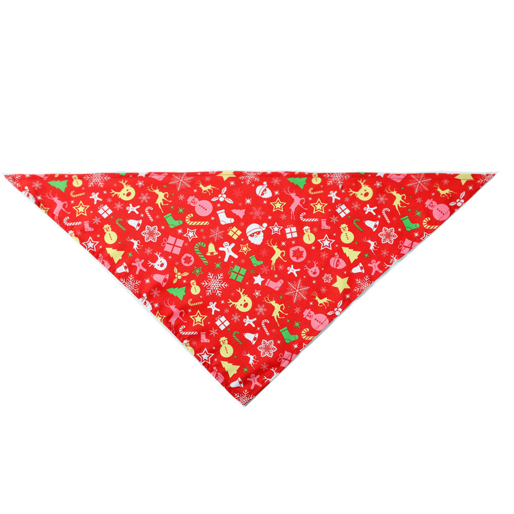 Red Christmas dog bandana with festive holiday patterns including Santa, stars, gifts, candy canes, and snowflakes