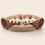 Load image into Gallery viewer, Collapsible cat tunnel with soft cushion, durable fabric, and interactive toys for playful and cozy pet entertainment.
