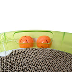 Load image into Gallery viewer, Close-up of 4-in-1 multifunctional pet toy with cardboard scratcher, orange teaser balls, and green plastic feeder frame
