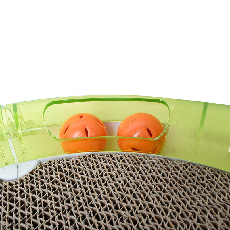 Close-up of 4-in-1 multifunctional pet toy with cardboard scratcher, orange teaser balls, and green plastic feeder frame
