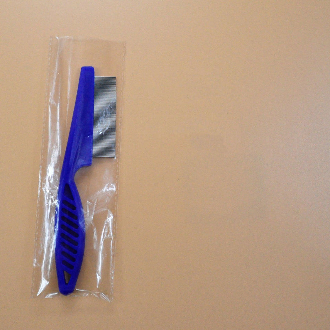 Blue stainless steel flea comb for pets in clear plastic wrap, effective grooming tool for flea and tangle removal.