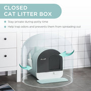 Enclosed cat litter box with lid, tray, and scoop designed for privacy and odor control in a modern bathroom setting.