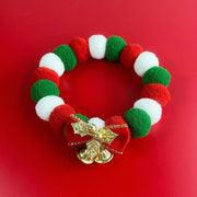 Christmas pet collar with red, green, white plush balls, featuring a bow and gold bells for dogs and cats holiday accessory