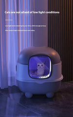 Load image into Gallery viewer, Oversized enclosed cat litter box with UV sterilization and soft blue light, showing a cat inside in low light environment
