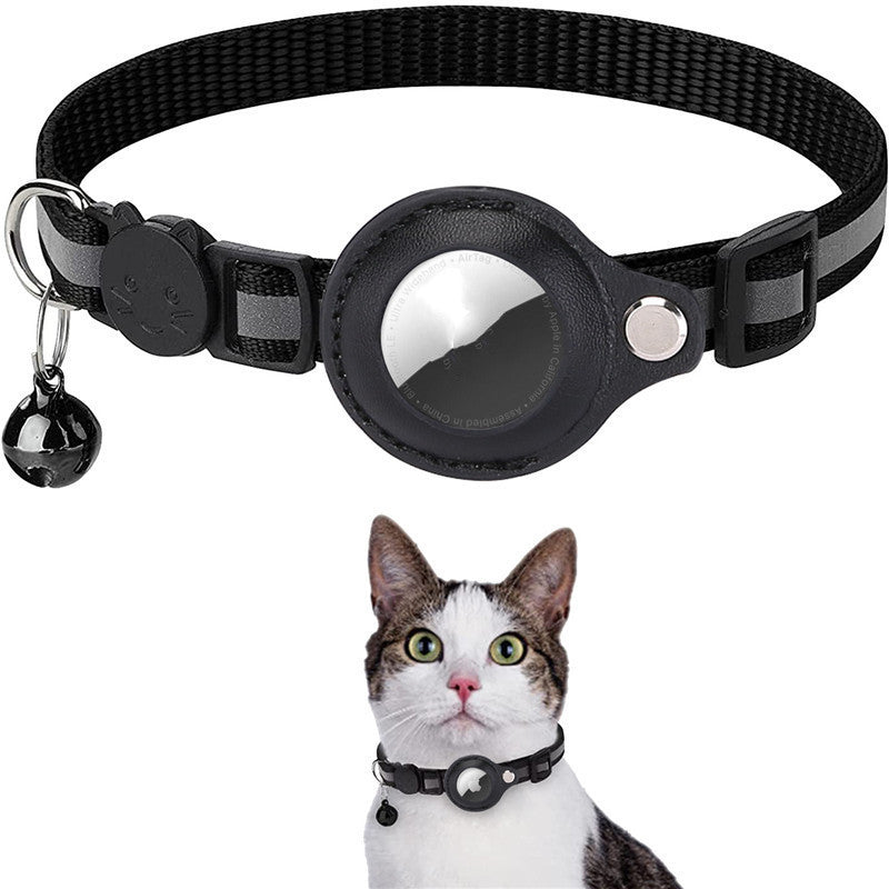 Adjustable reflective nylon pet collar with waterproof AirTag holder and bell for cats and dogs shown on a cat.