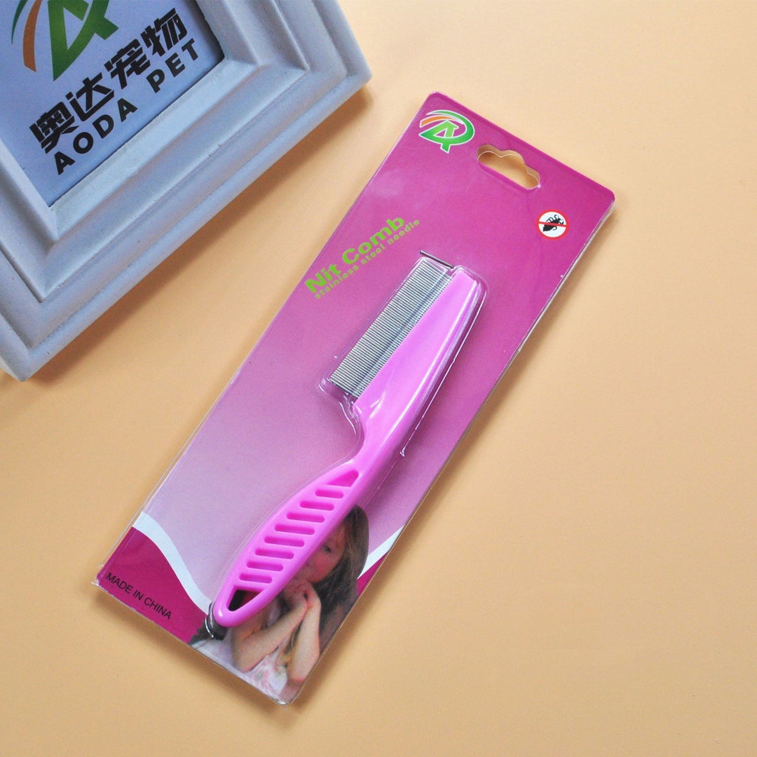 Pink pet grooming flea comb in retail packaging, fine tooth stainless steel tool for daily flea control in pets.