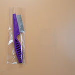 Load image into Gallery viewer, Purple pet grooming flea comb in clear plastic wrap, fine tooth stainless steel comb for flea and tangle removal.