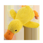 Load image into Gallery viewer, Yellow plush duck dog toy with orange beak and feet designed as a calming chew pillow for puppies and dogs
