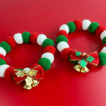 Load image into Gallery viewer, Christmas pet collars with plush red, green, and white balls, decorated with holiday bows and gold bells for dogs and cats

