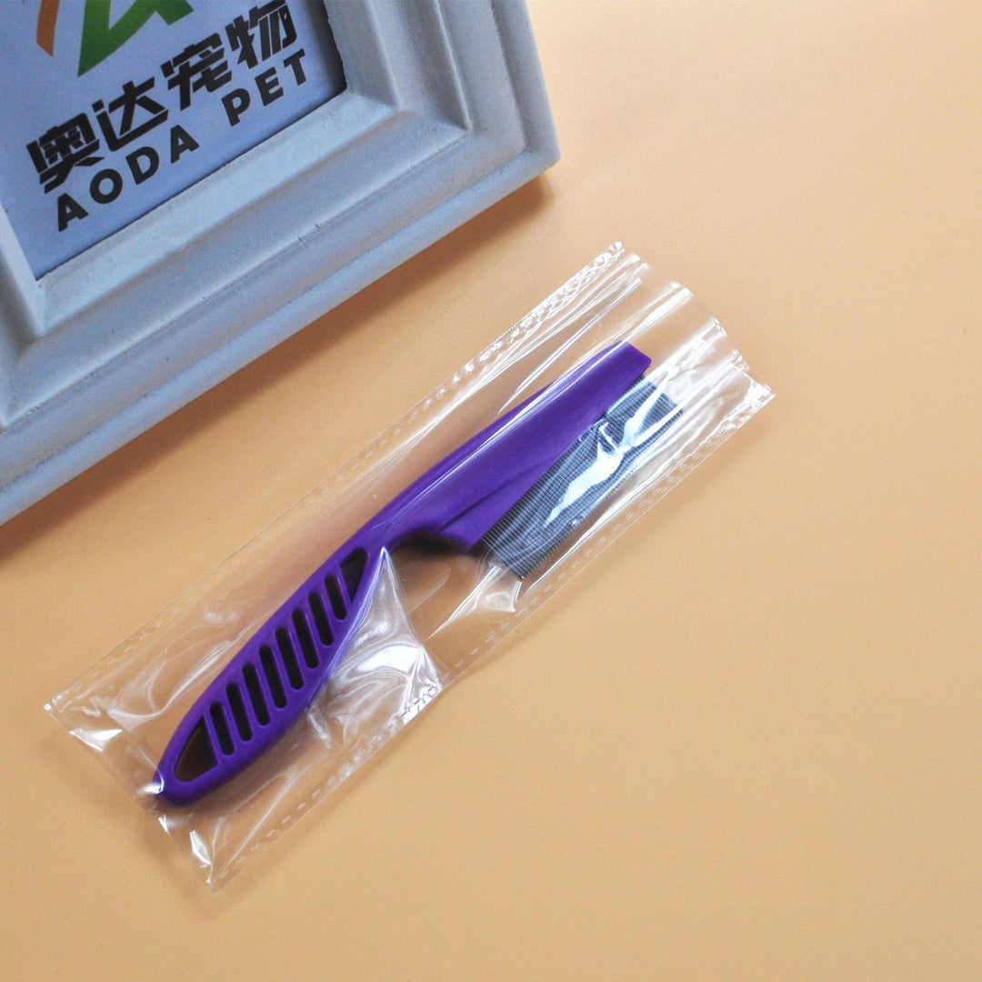 Purple flea comb for pets in sealed plastic wrap, fine tooth stainless steel grooming tool for cats and dogs.