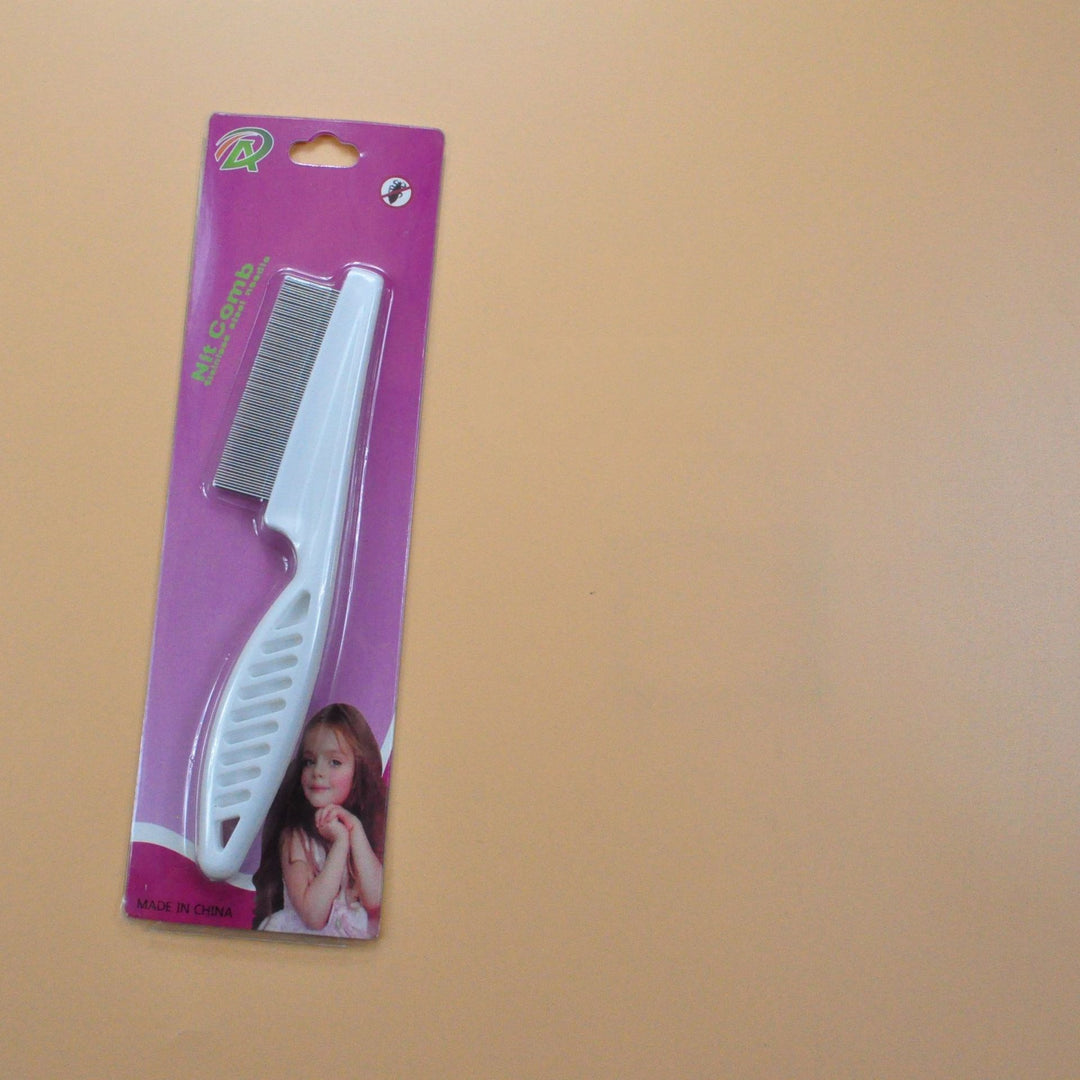 White stainless steel flea comb for pets in retail packaging, anti-flea grooming tool for dogs and cats, gentle and effective.