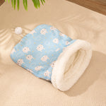 Load image into Gallery viewer, Blue flannel cat sleeping bag with white sheep pattern and soft plush lining for cozy pet comfort.
