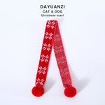 Load image into Gallery viewer, Red knitted Christmas scarf for small dogs and cats with snowflake pattern and pom-poms on each end
