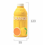 Load image into Gallery viewer, Yellow latex dog toy shaped like an orange juice bottle with fruit design, chew-resistant and floating craft.

