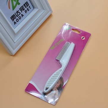 White anti-flea pet grooming comb in retail packaging, stainless steel fine teeth for effective flea removal in pets.