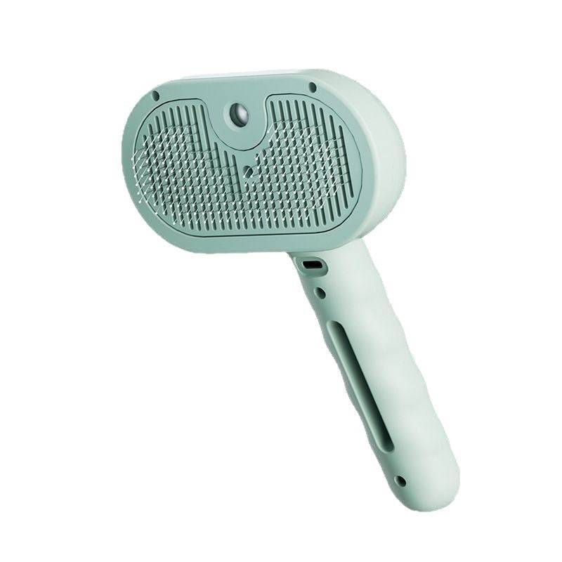 Green Self-Cleaning Pet Comb with ergonomic handle and mist spray nozzle, ideal for pet grooming and detangling fur in cats and dogs.
