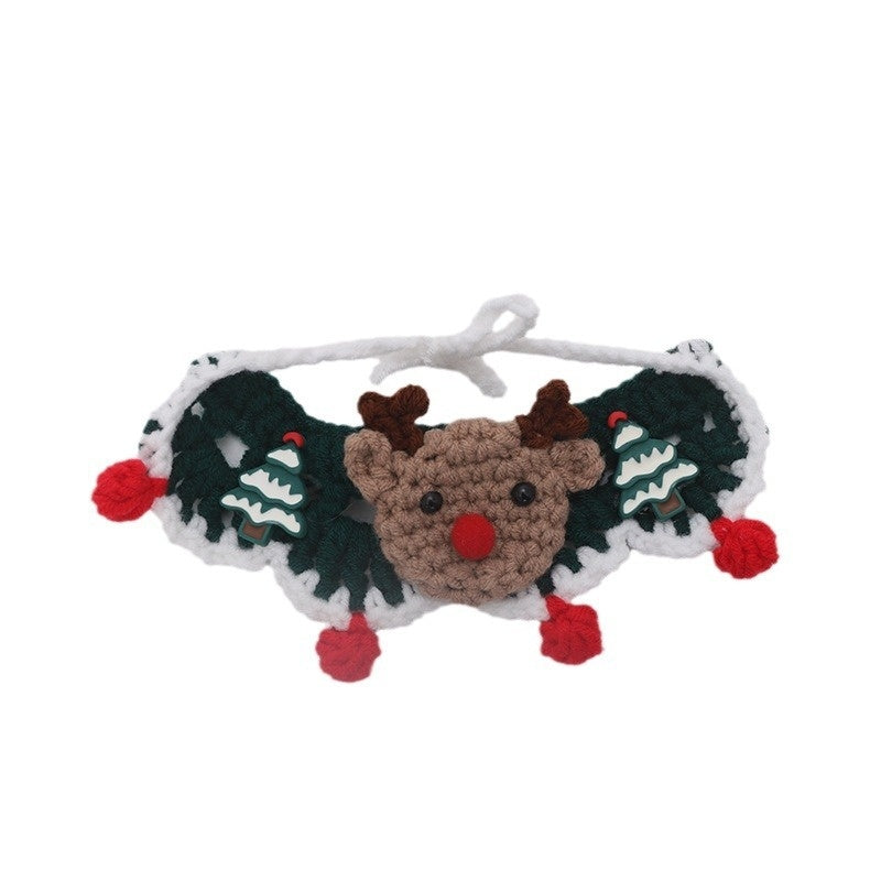 Crocheted Christmas pet collar scarf with reindeer face, fir tree decorations, and red pom-poms for cats and dogs.