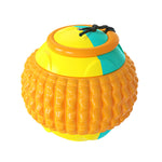 Load image into Gallery viewer, Colorful dog chew ball with textured surface and attached draw rope for training and teeth cleaning functions
