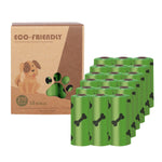 Load image into Gallery viewer, Eco-friendly green poop bags with black bone prints, 18 rolls for hassle-free dog waste cleanup on the go.
