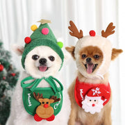 Two small dogs wearing Christmas hats and adjustable saliva towel bibs with reindeer and Santa designs