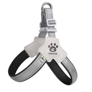 Adjustable no-pull reflective pet harness with padded straps for comfortable walking and training of dogs and cats