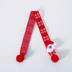 Load image into Gallery viewer, Red knitted wool pet scarf with white snowflake pattern and a small Santa Claus decoration for holiday pets.
