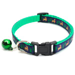 Load image into Gallery viewer, Green festive pet collar with cartoon reindeer and trees pattern and a green Christmas bell attached
