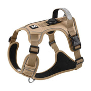 Tan no-pull dog harness with reflective trim and GPS tag slot, ideal for safe outdoor walks and anti-breakaway control.