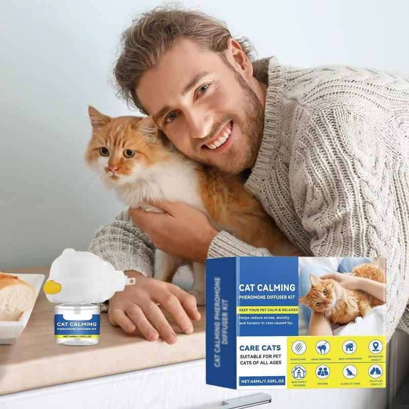 Man holding an orange and white cat next to a cat calming pheromone diffuser refill and product packaging on a table